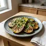 Aubergines rôties au citron et coriandre fraîche