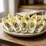 Barquettes d'endives au Carré frais : apéritif frais et gourmand