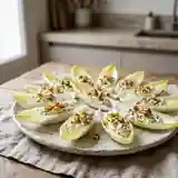 Barquettes d'endives croquantes au miel et noix
