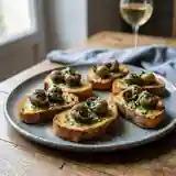 Bouchées apéritives gourmandes aux escargots et beurre persillé