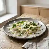 Carpaccio de bar frais aux agrumes et huile d'olive