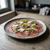 Carpaccio de bœuf fondant au parmesan