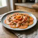 Carpaccio de truite fraîche aux agrumes et herbes fraîches