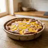 Clafoutis fondant aux pêches juteuses