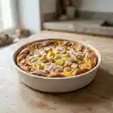 Clafoutis gourmand à l'ananas, raisin et pommes