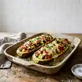 Courgettes farcies aux tomates fraîches et mozzarella fondante