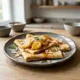 Crêpes à la banane flambées : dessert gourmand et facile