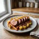 Filet de marcassin rôti à l'orange et ses légumes de saison