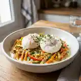 Oeufs pochés sur fondue de légumes colorée