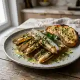 Pieds de couteaux sautés à l'ail et au persil, recette traditionnelle de fruits de mer