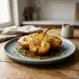 Poires fondantes au vinaigre et estragon frais : recette gourmande et raffinée