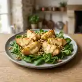 Pommes rôties au Rocamadour sur lit de mâche fraîche