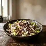 Salade gourmande d'endives aux magrets de canard fumés