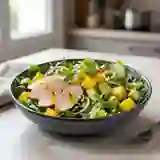 Salade poulet fumé, mangue et avocat fondant