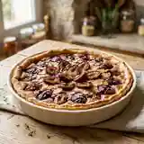 Tarte aux prunes juteuses et sirop de cassis gourmand