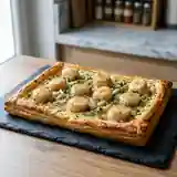 Tarte fine aux coquilles Saint-Jacques : recette raffinée et facile