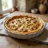 Tarte fondante aux oignons caramélisés et fromage râpé