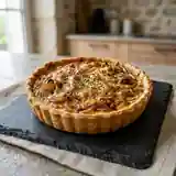 Tarte niçoise aux oignons fondants et herbes de Provence