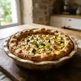 Tourte fondante courgette et feta : recette facile et savoureuse